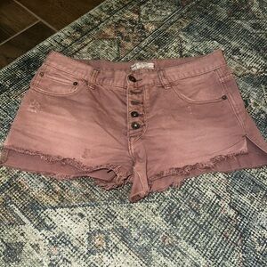 Free People Faded Pink Jean Shorts with Frayed Hem and split sides